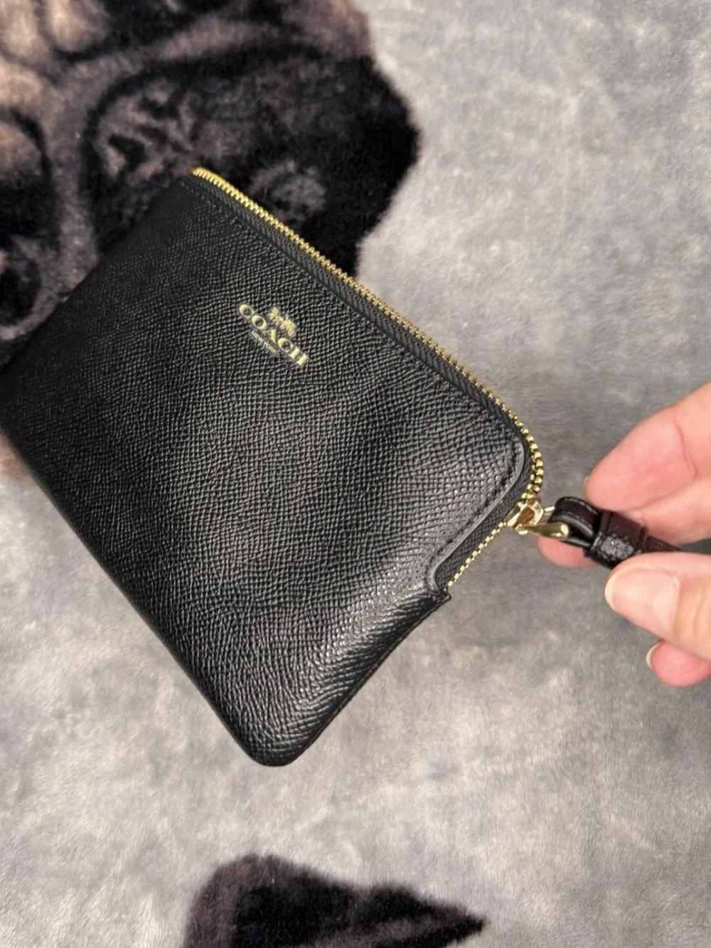 Coach Black pebbled Leather Wristlet with Gold Logo
